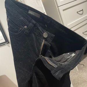 Black velvet size four skinny jeans